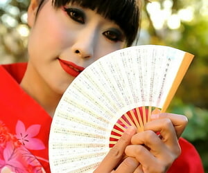 Japanese Geisha pleasures a..